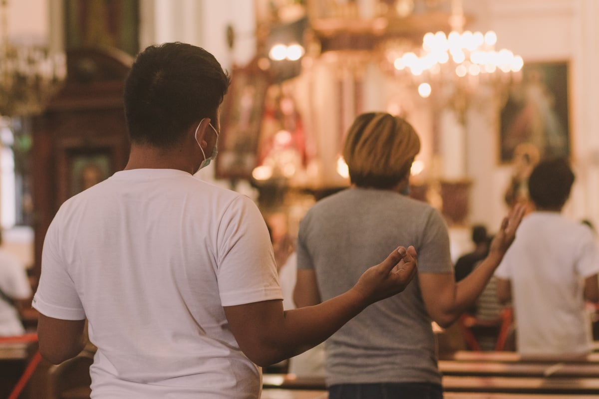 People Attending Mass